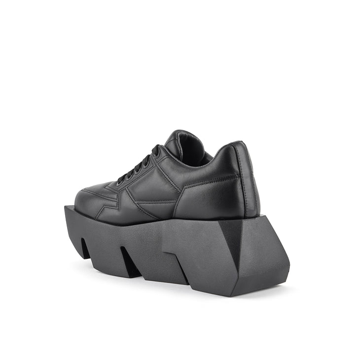 bull puffy sneaker black ii 4 angle in