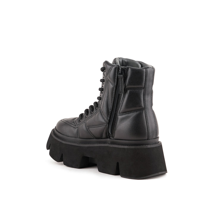 stomper puffy combat black 4 angle in