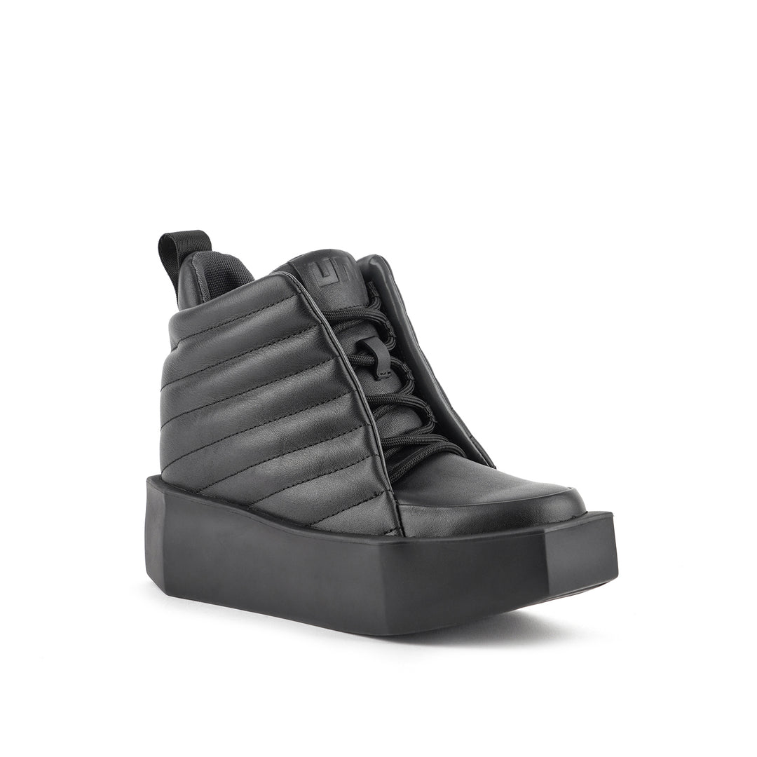stone puffy mid black 2 angle out