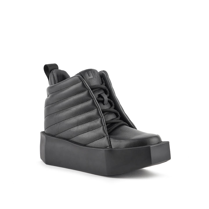 stone puffy mid black 2 angle out