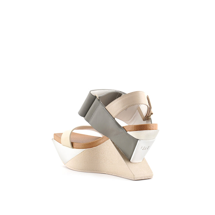 delta wedge sandal nude angle in view