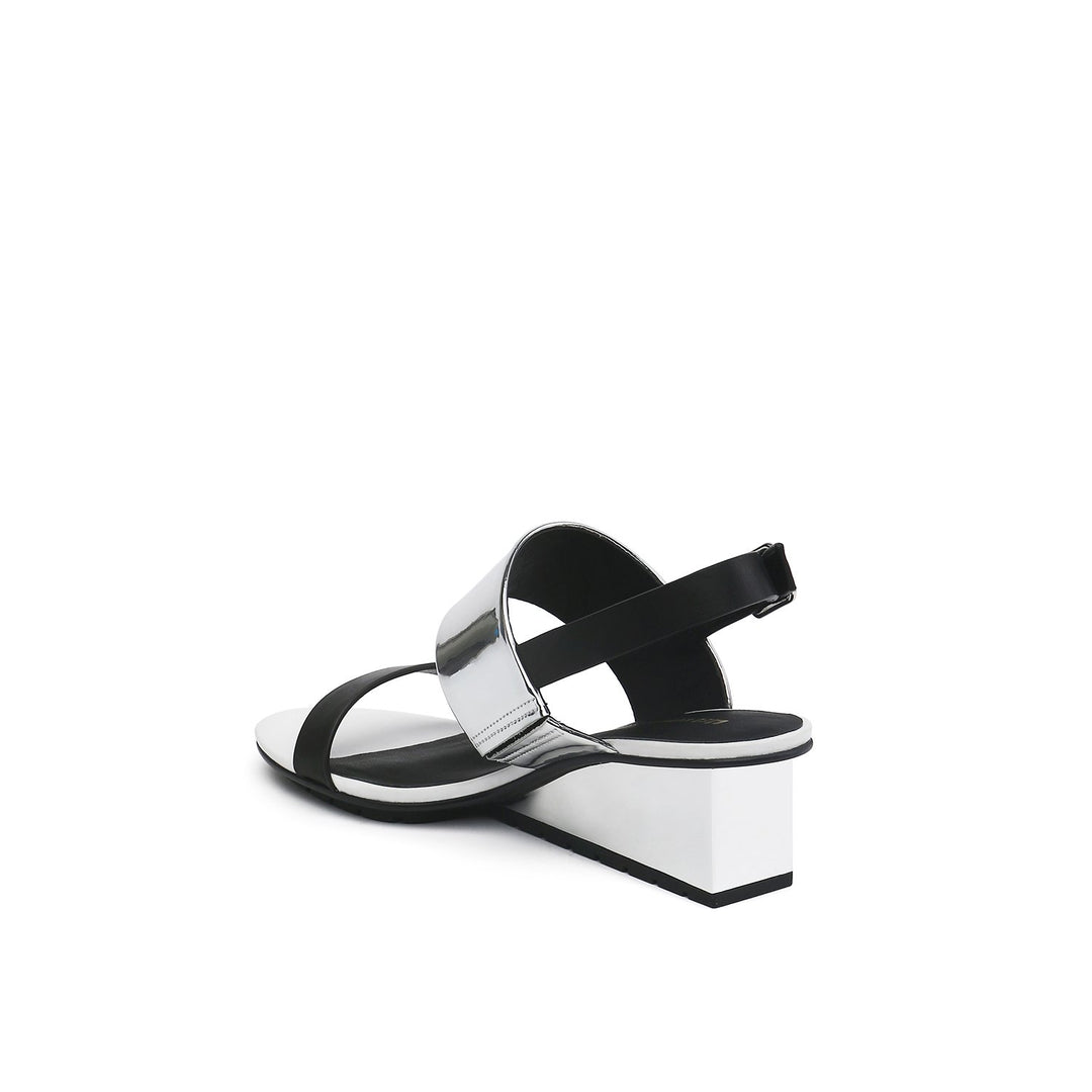 solid slingback mid black + silver angle in view