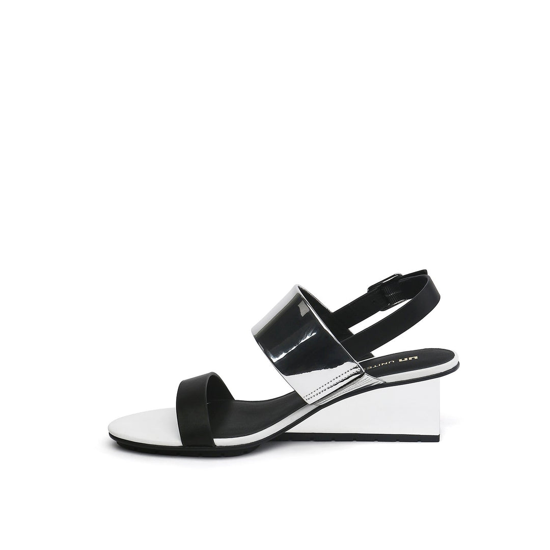 solid slingback mid black + silver in view
