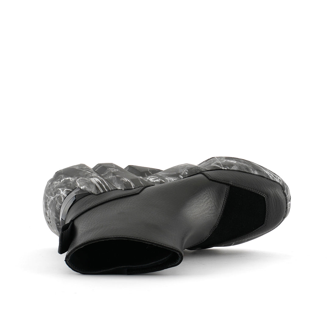 space kick v boot women black marble top view