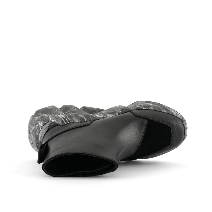 space kick v boot women black marble top view