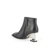 un bootie mid ii black 4 angle in view aw23